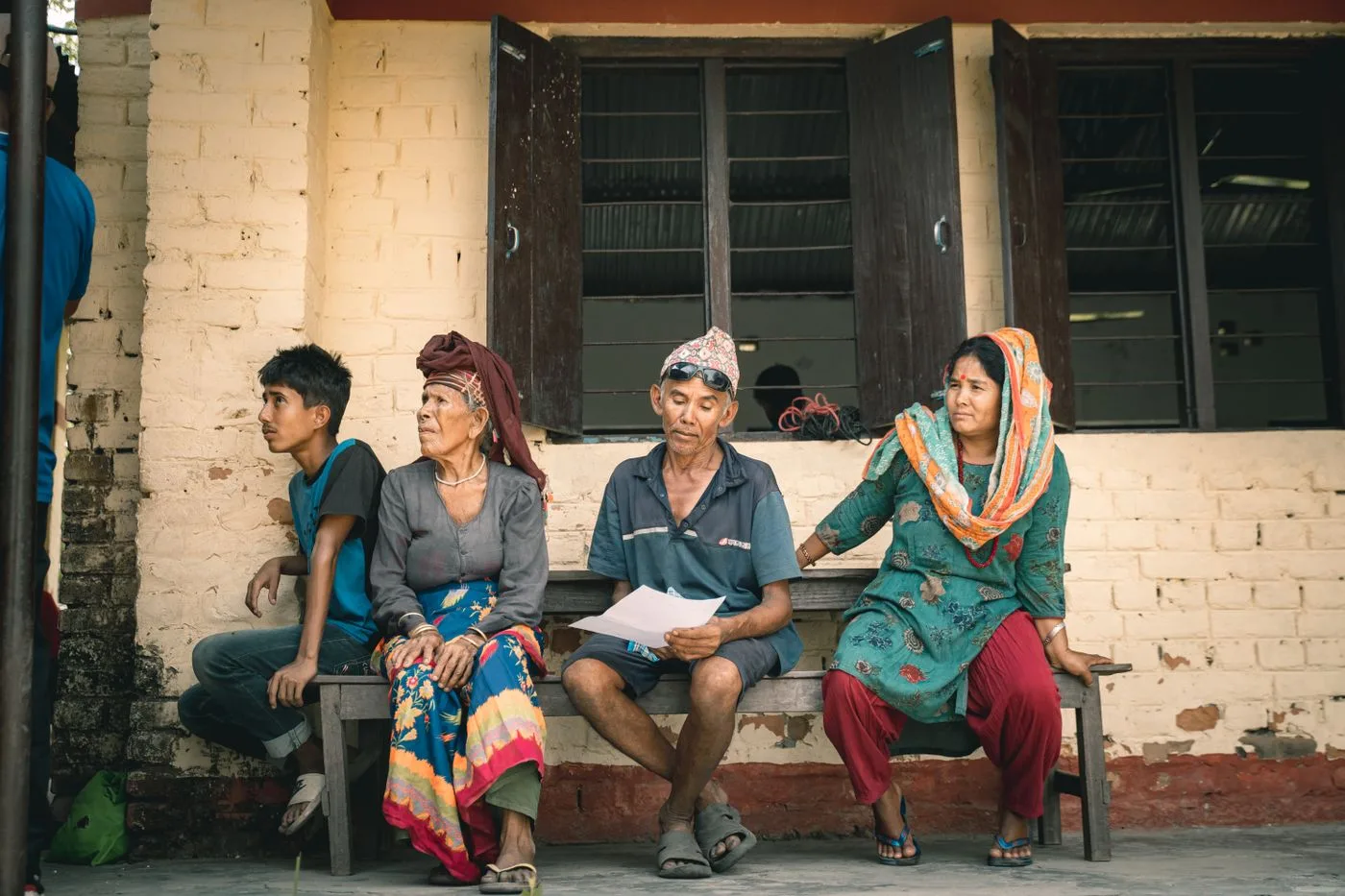 A family outside a community clinic
